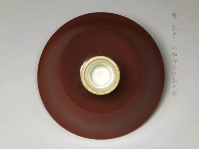 永乐瓷器红釉暗龙纹高足碗赏析